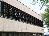 Fenstergitter in braun als Einbruchschutz bei Bürogebäude 